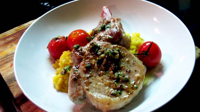 Pork Cutlets with Marjoram, Cherry Tomatoes and Saffron Risotto